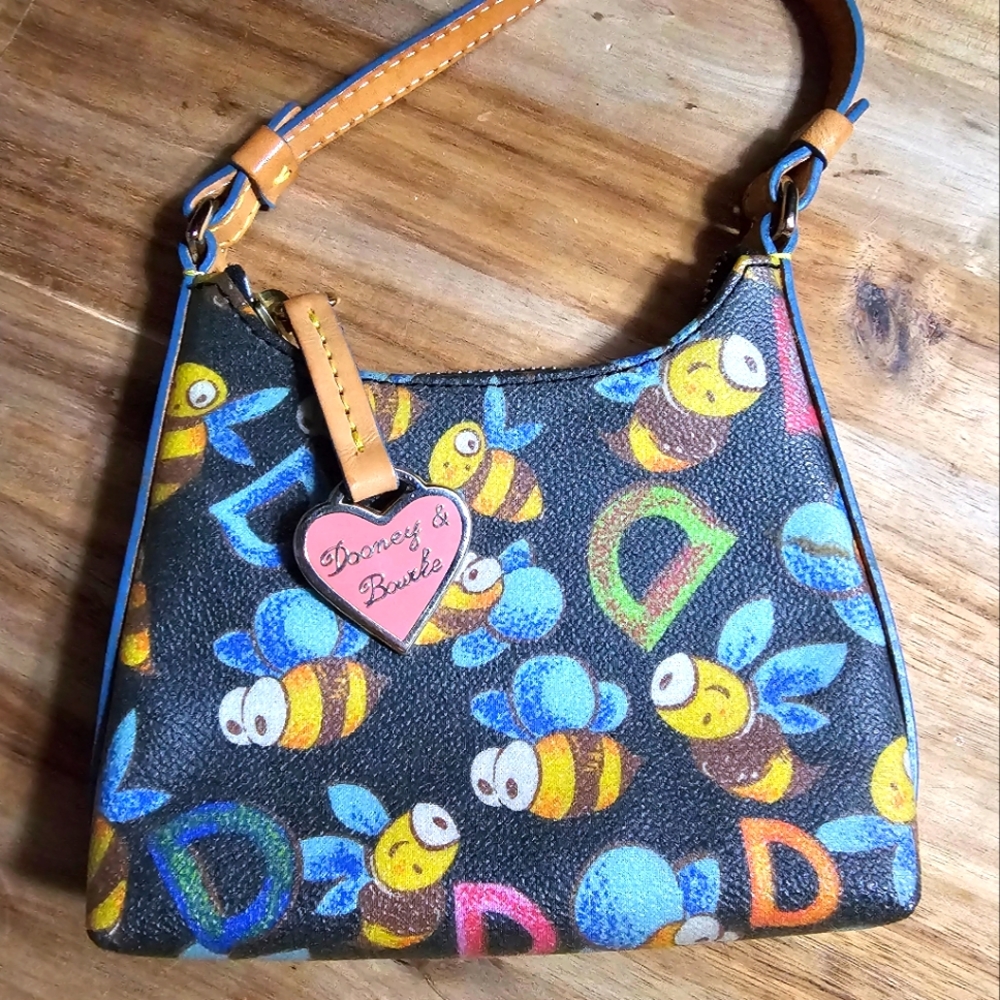 Dooney & Bourke Bee Wristlet with rainbow zipper